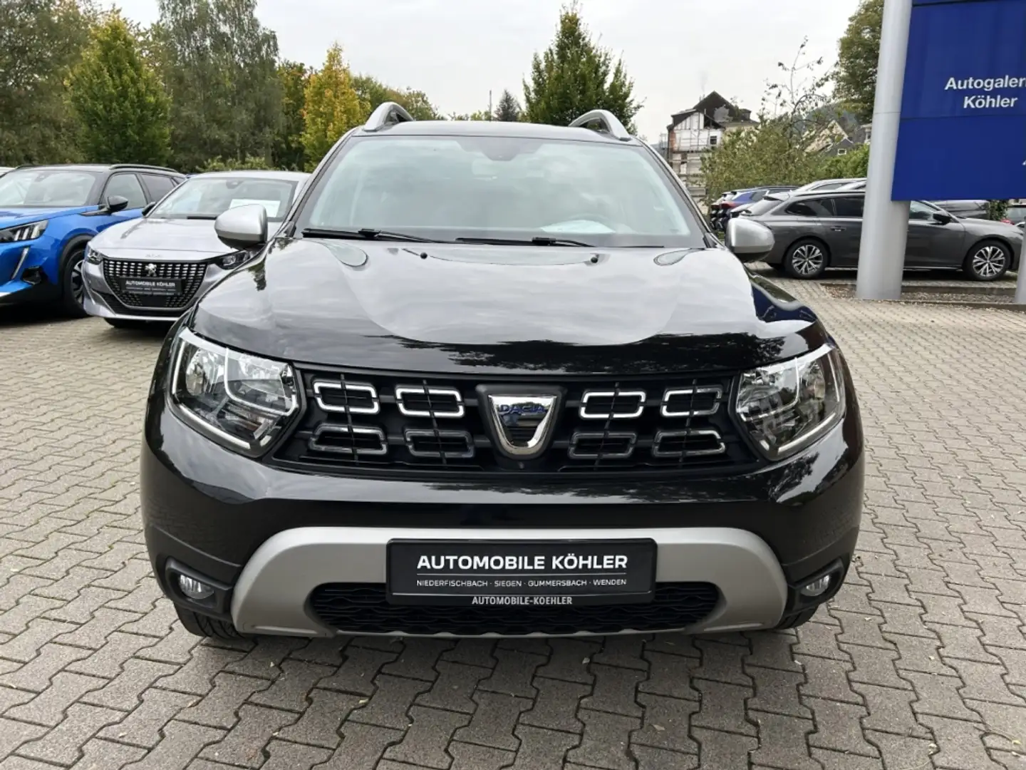 Dacia Duster II 1.6 16V 4x2 Prestige Navi 360 Kamera Klimaautom Schwarz - 2