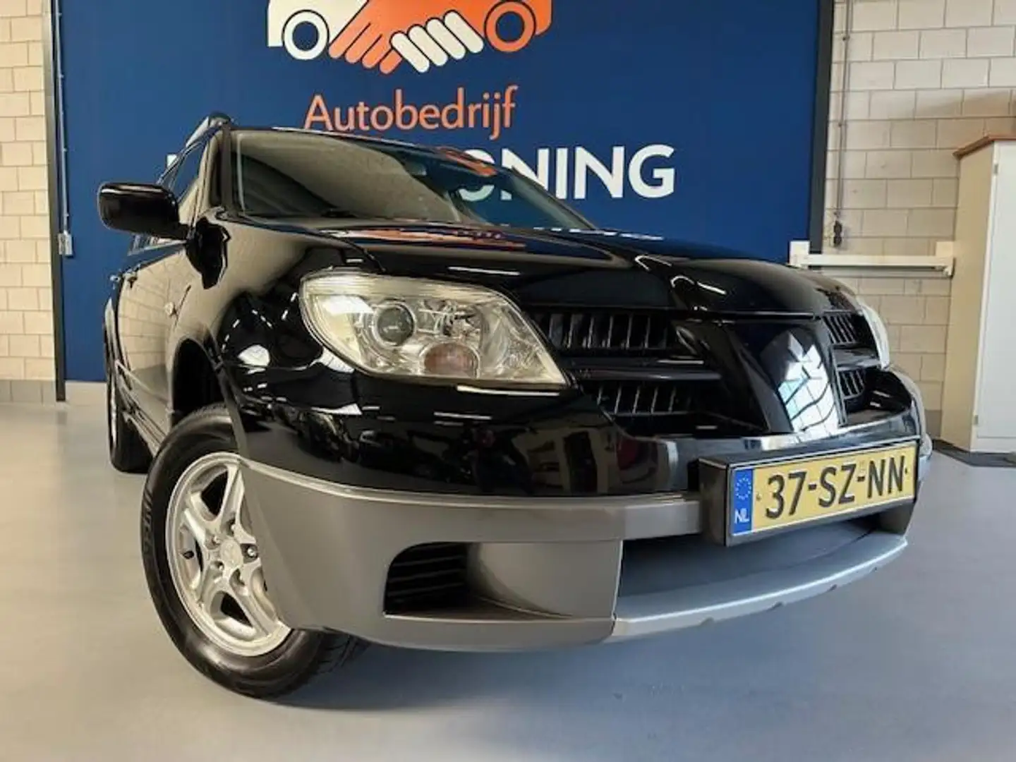 Mitsubishi Outlander Sport 2.0 Invite+/ bj.2006 / kleur: zwart/ NAP met Nero - 2