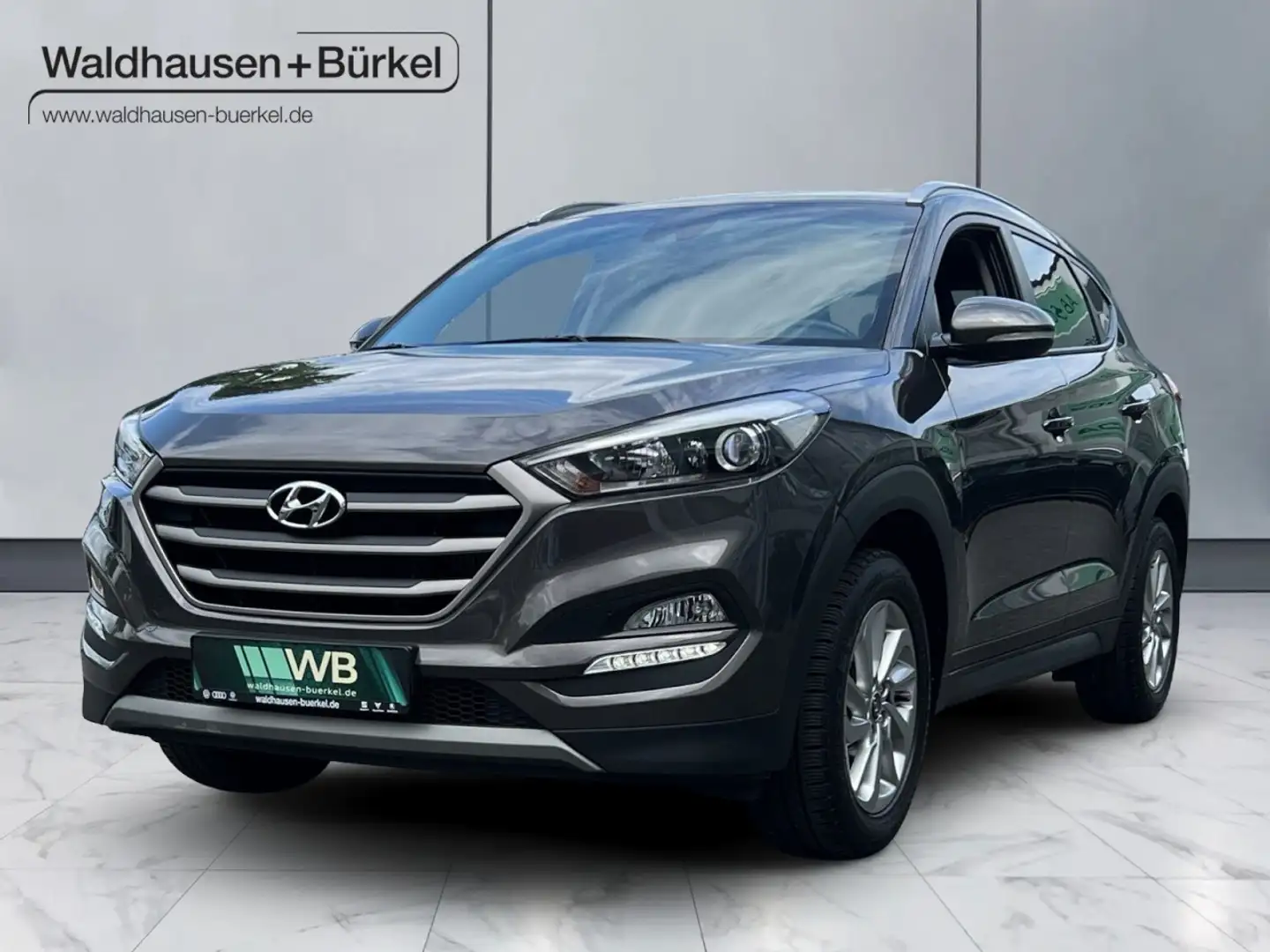 Hyundai TUCSON 1.6 Advantage 4WD *AHK *R.KAM *NAVI Klima Navi Bronze - 1