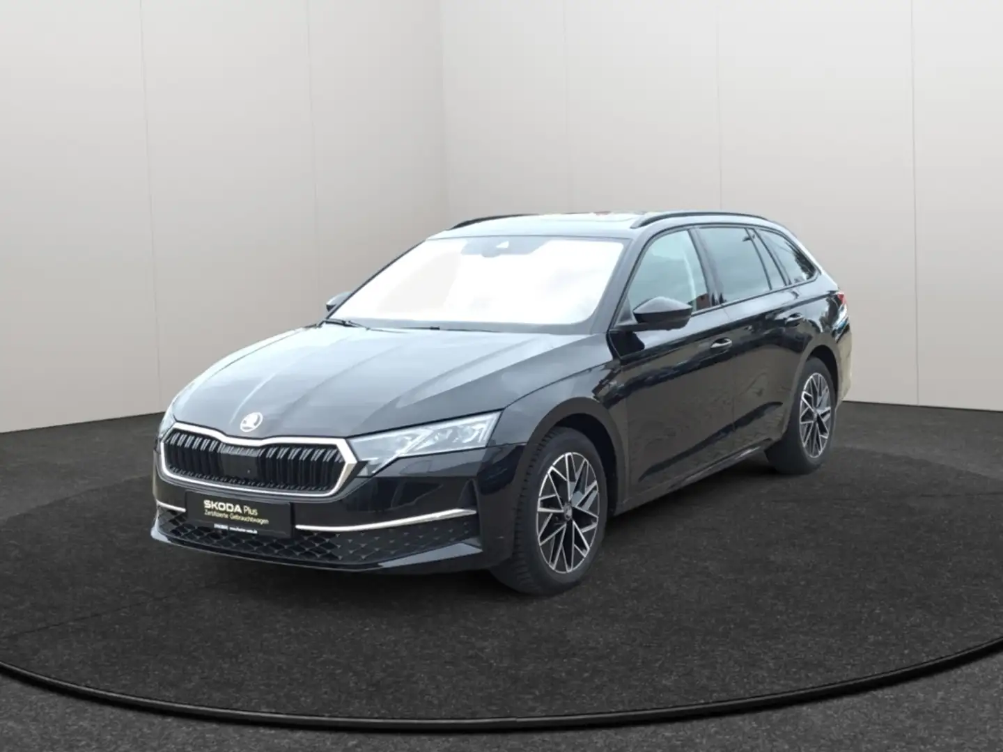 Skoda Octavia Combi 2.0TDI DSG Tour LED AHK Navi 360° ACC Schwarz - 1