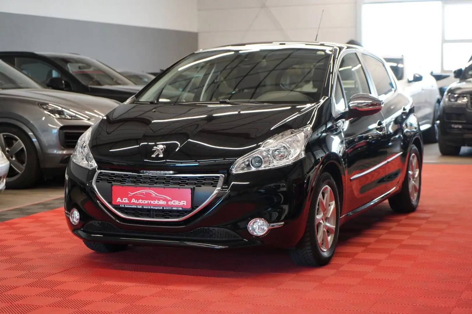 Peugeot 208 1.2 Lim. Style 1.Hand*Unfallfrei*Klima*Pano* Schwarz - 1