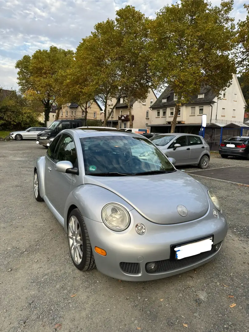 Volkswagen New Beetle Срібний - 1