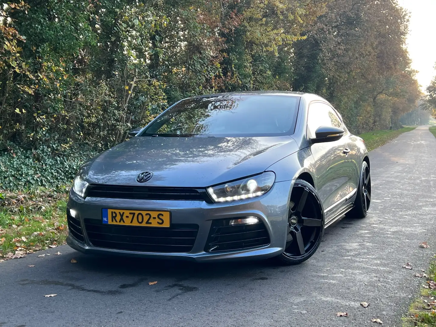 Volkswagen Scirocco 2.0 TSI Highline Plus | Automaat + Cruise Nu € 8.4 Grijs - 1