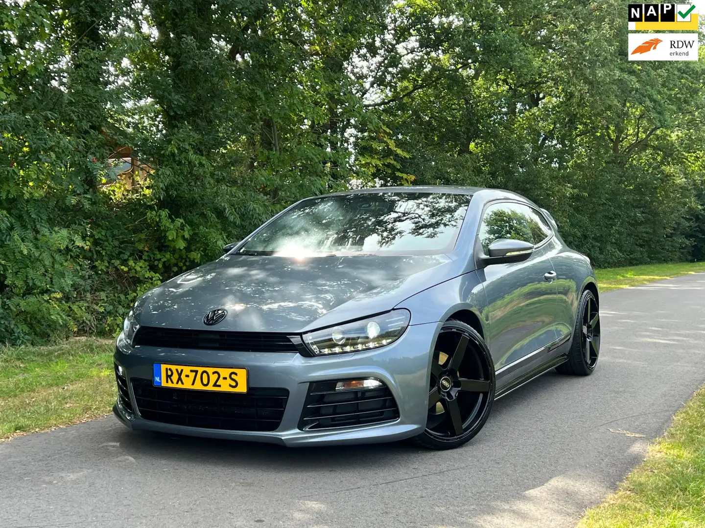 Volkswagen Scirocco 2.0 TSI Highline Plus | Automaat + Cruise Nu € 8.9 Grijs - 1