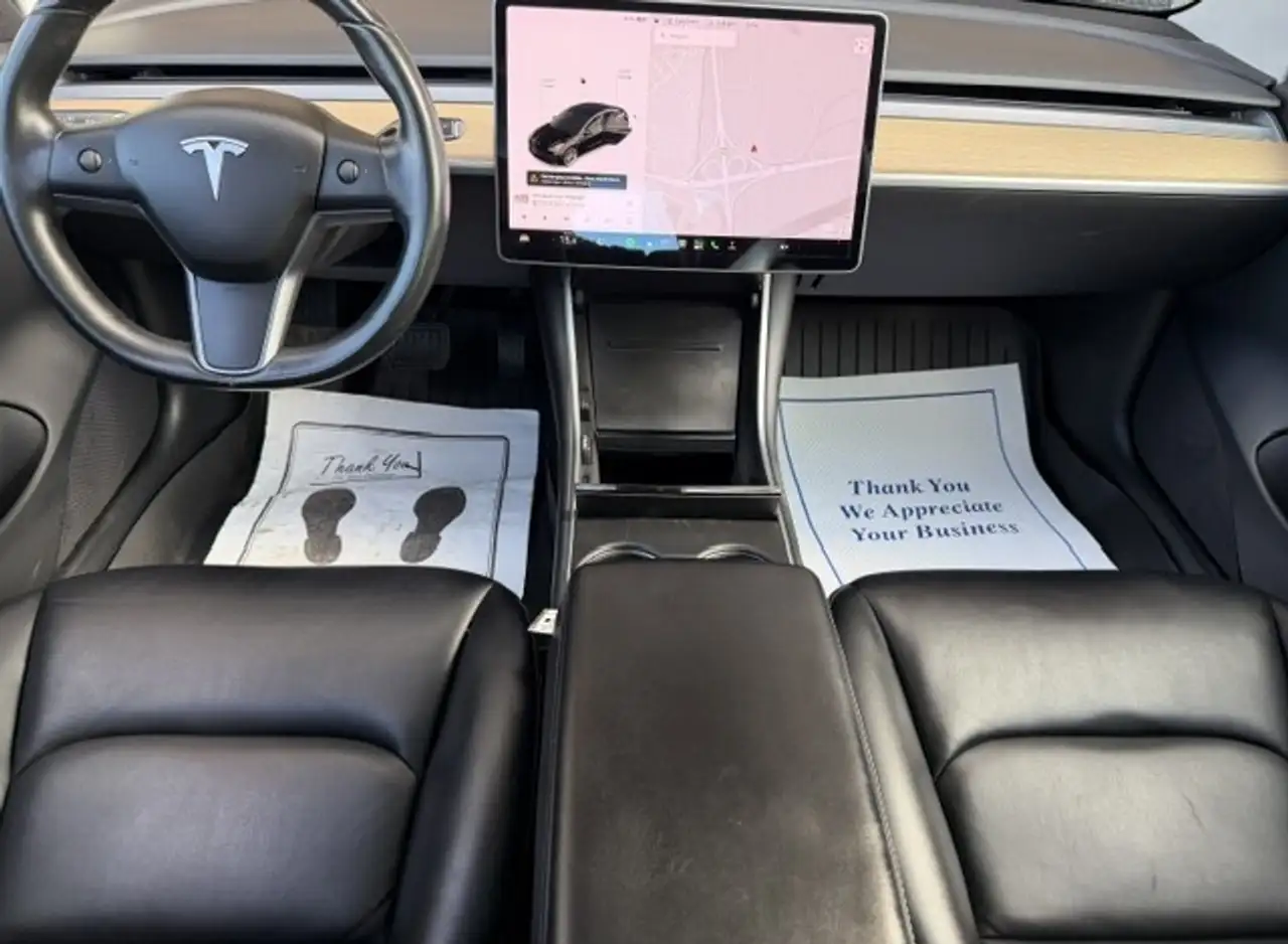 Tesla Model 3 photo Tesla Model 3