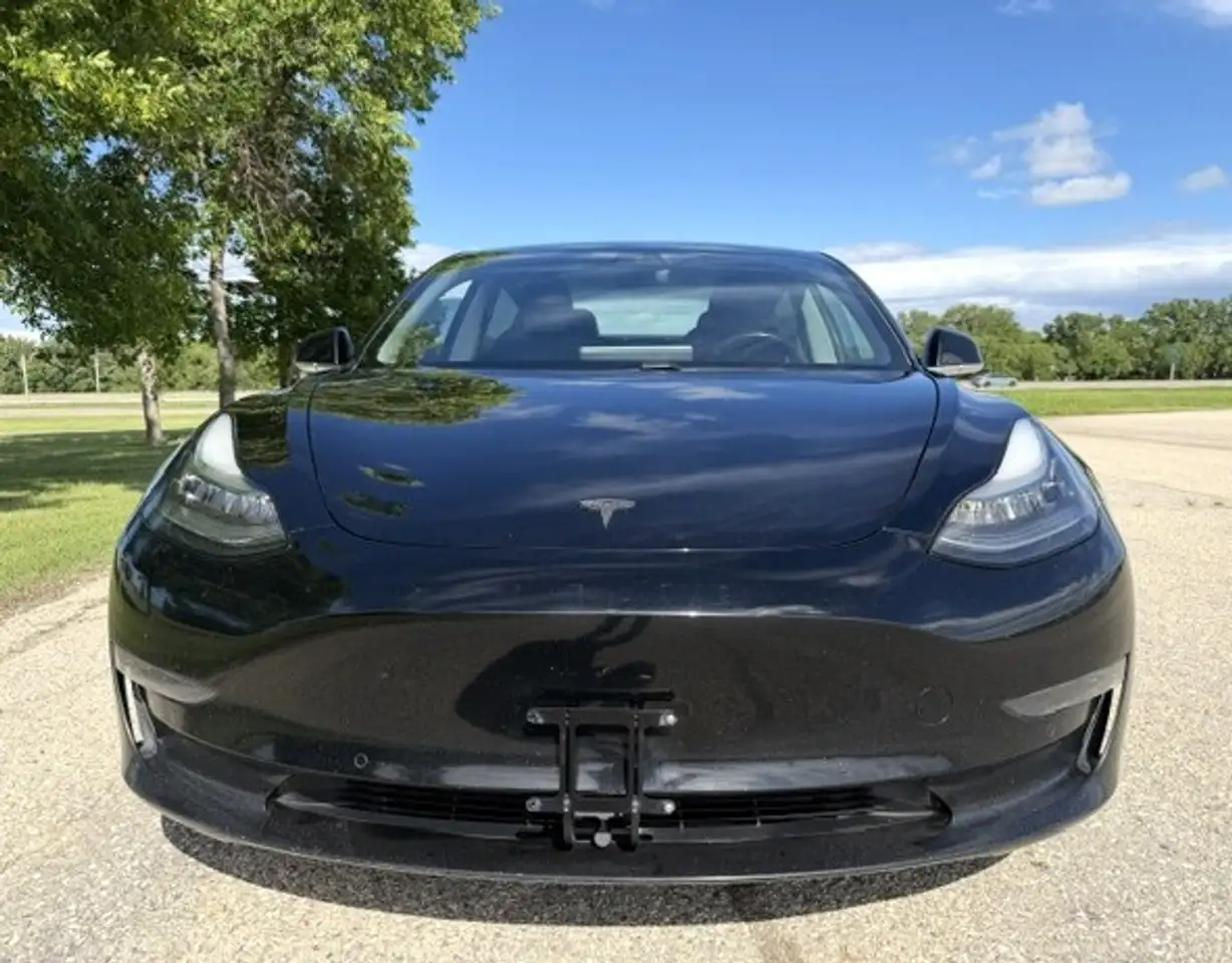 Tesla Model 3 photo Tesla Model 3
