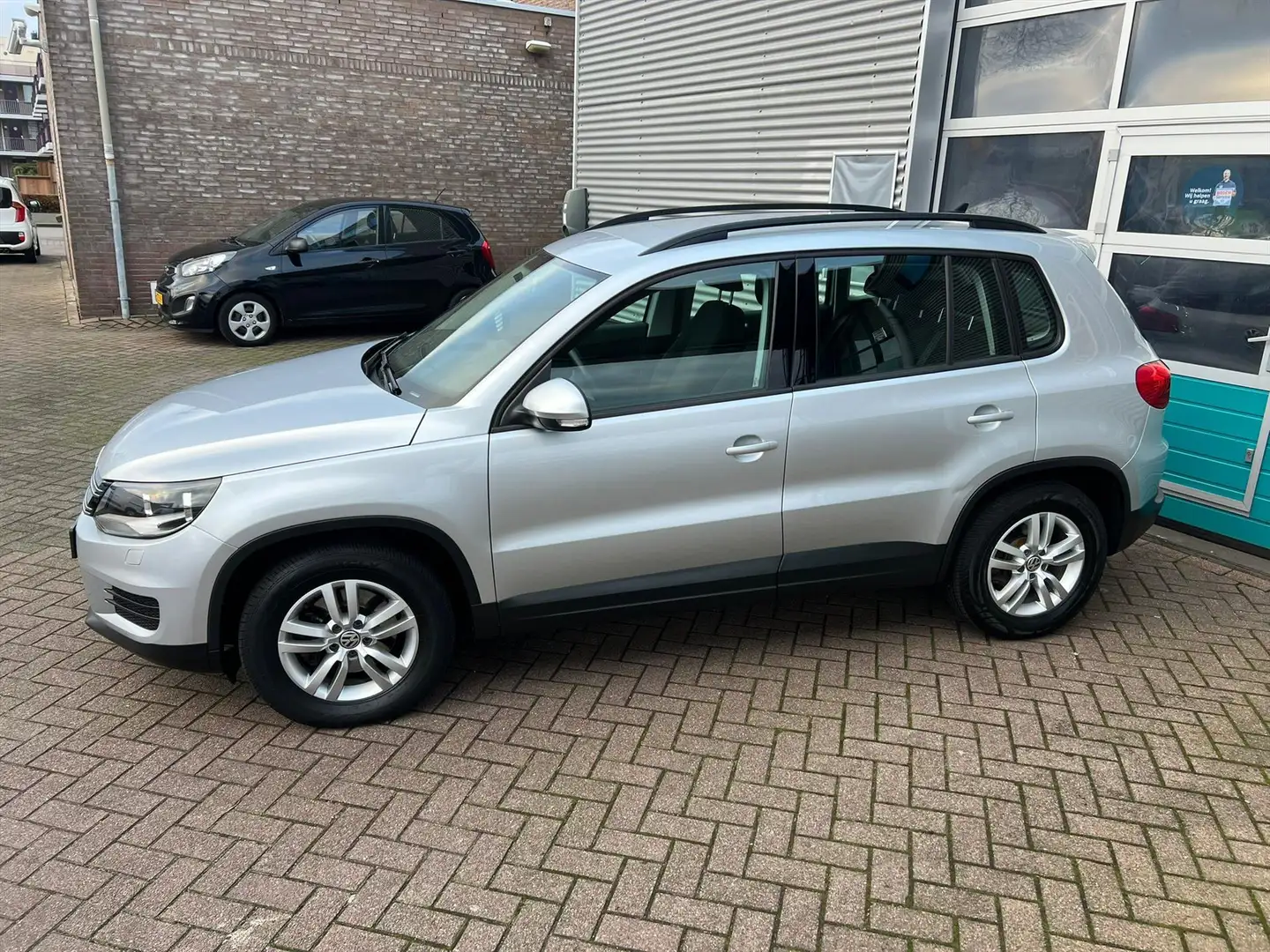 Volkswagen Tiguan 1.4 TSI 122pk BlueMotion Technology Sport &amp; St Grijs - 1