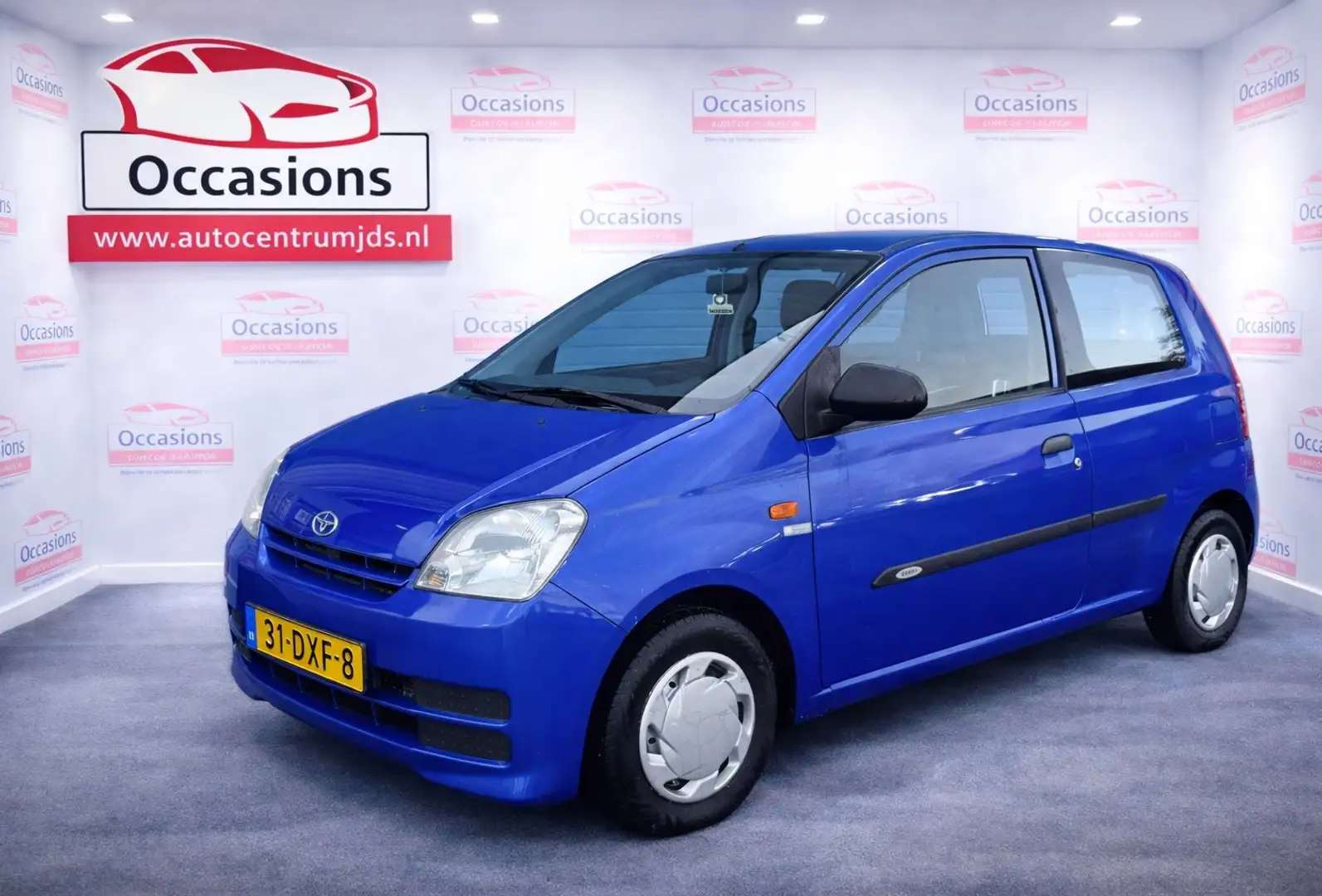 Daihatsu Cuore 1.0-12V Osaka. 1e eigenaar ! Azul - 1