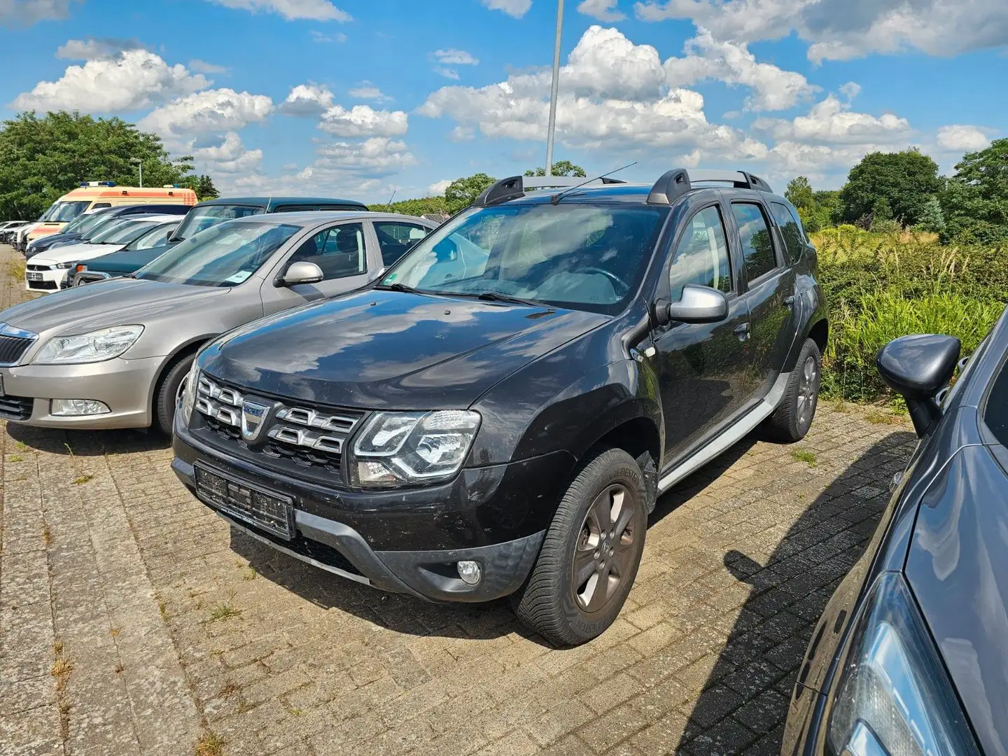Dacia Duster I Prestige Leder+Navi+AHK+SHZ+PDC Schwarz - 1