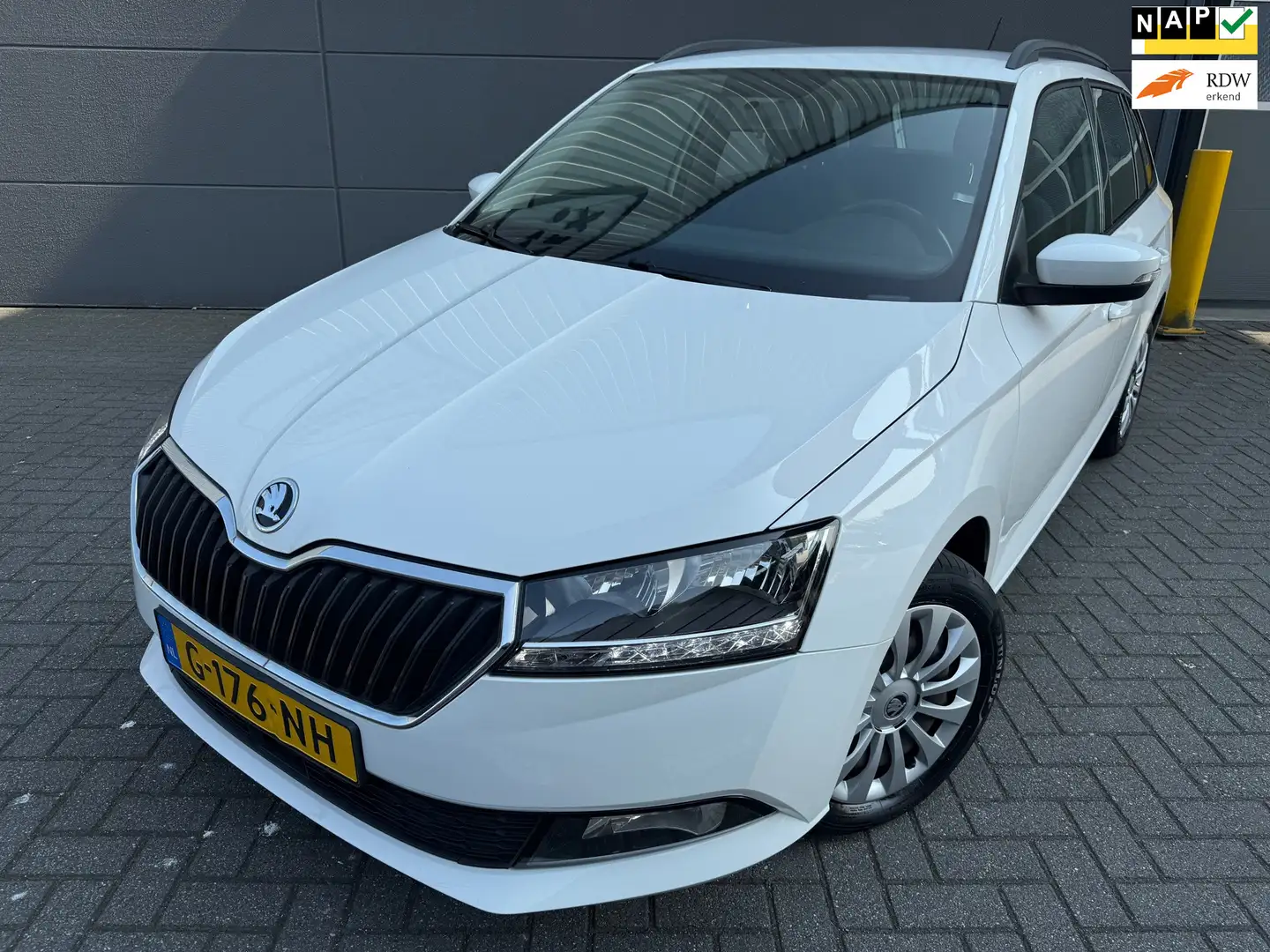 Skoda Fabia Combi 1.0 TSI Ambition*AIRCO*APK*NAP*CRUISE*NAVI*P Wit - 1