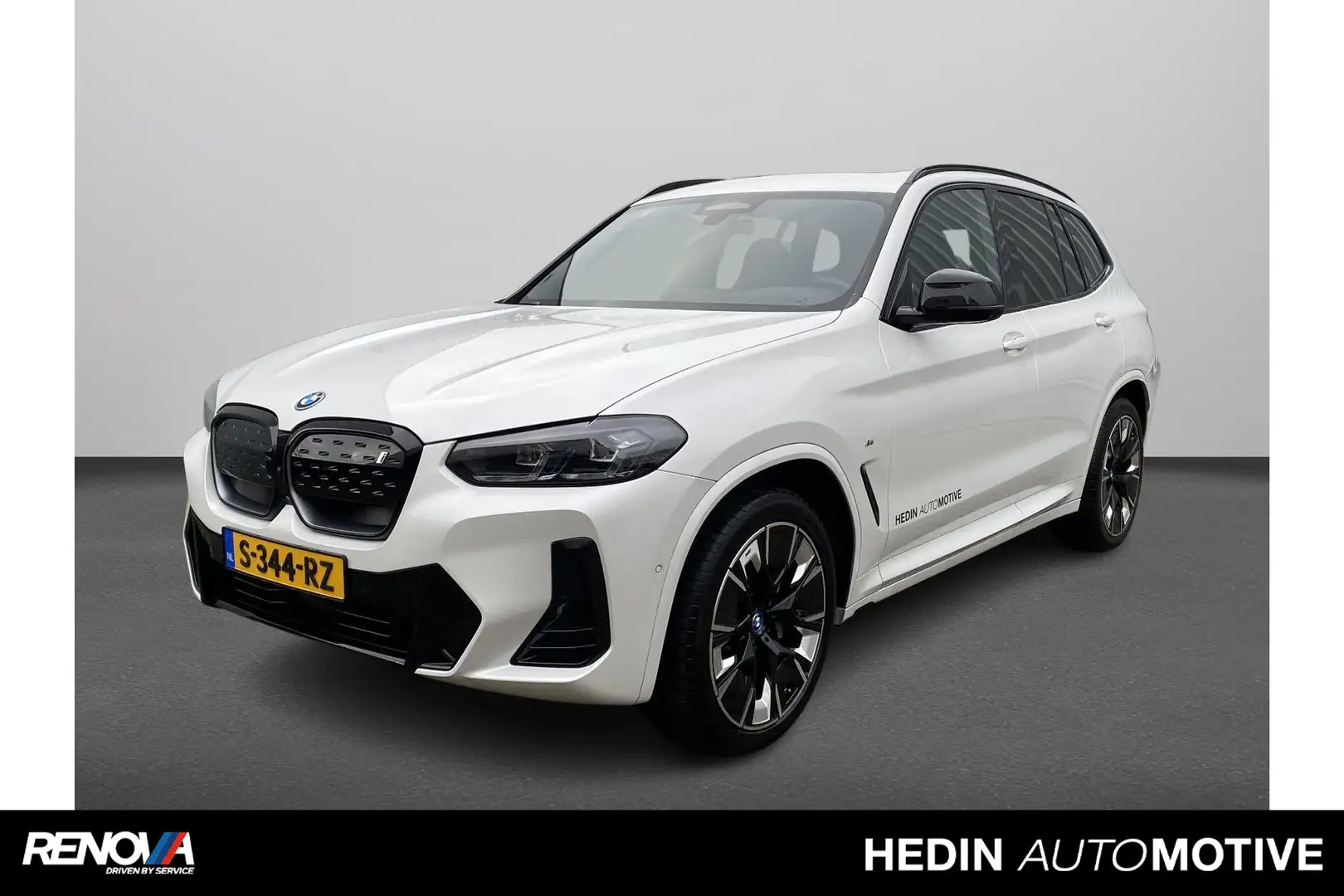 BMW iX3 High Executive M-Sport | 20 inch | Panoramadak | C Wit - 1