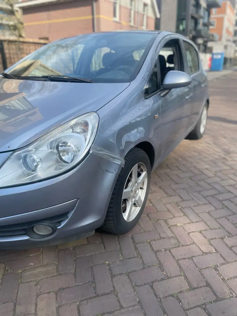 Opel Corsa 1.2-16V Enjoy D Grijs - 1