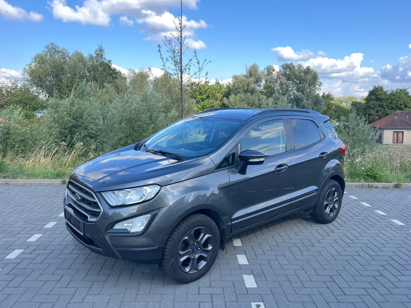 Ford EcoSport 1.0 EcoBoost-AIRCO-GPS-JANTES Gris - 1