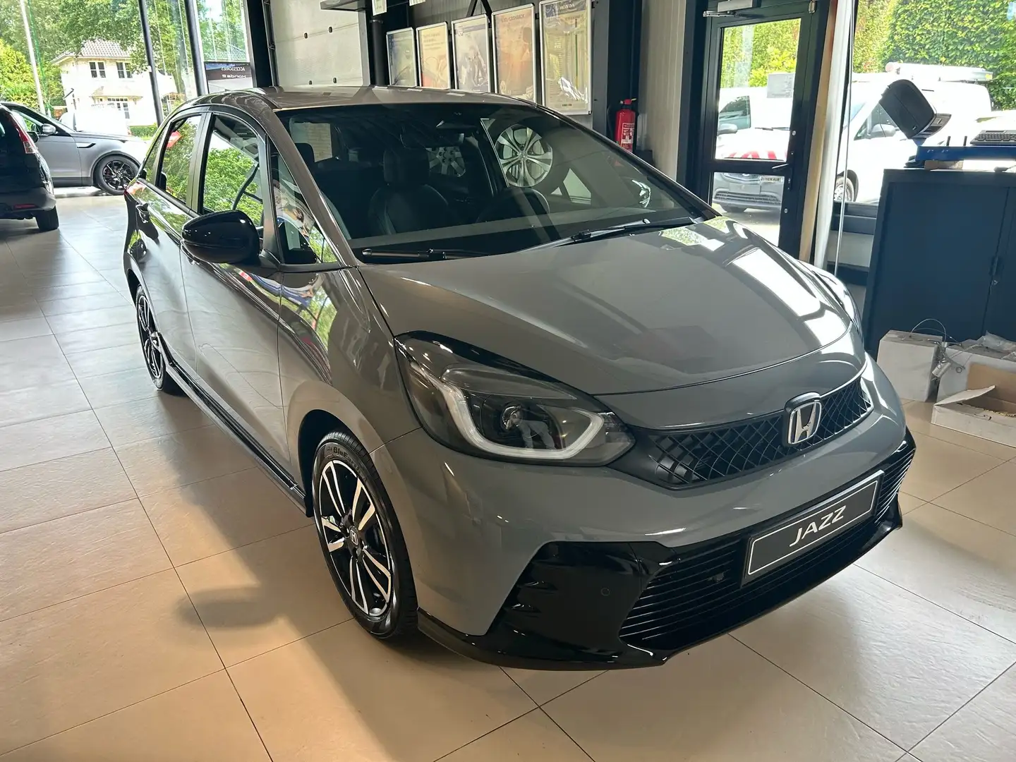 Honda Jazz 1.5i-MMD e:HEV Advance Sport -€4000 JUNI ACTIE Grijs - 1