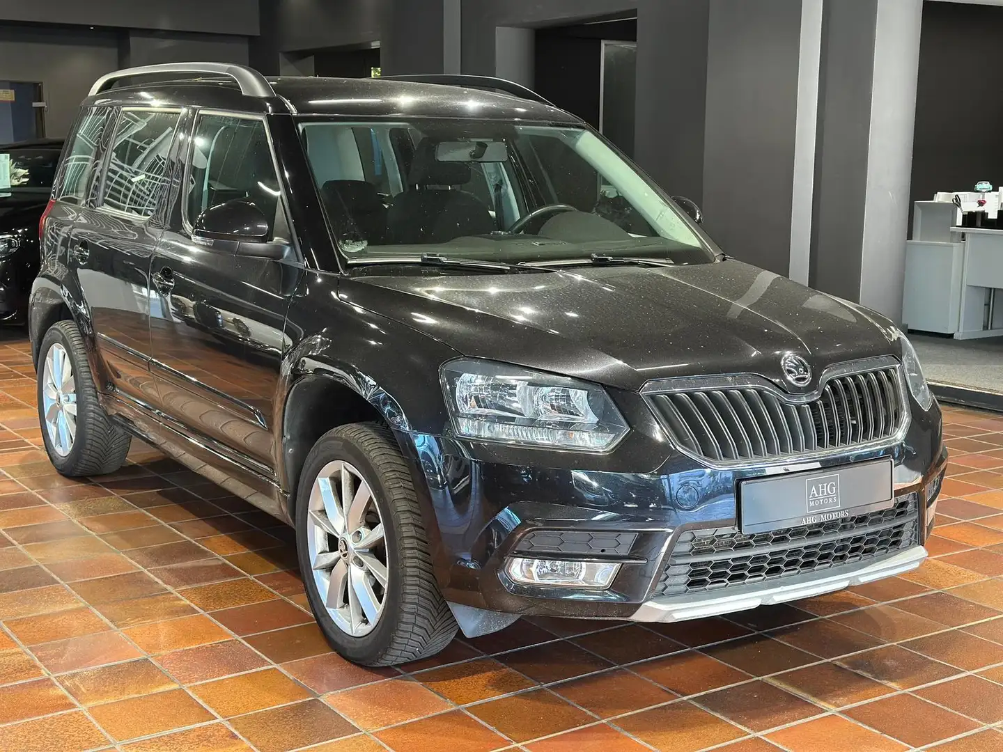 Skoda Yeti 1.4 TSI AMBITION KLIMAAUTO SHZ AHK ALU PDC BLUETOO Schwarz - 1