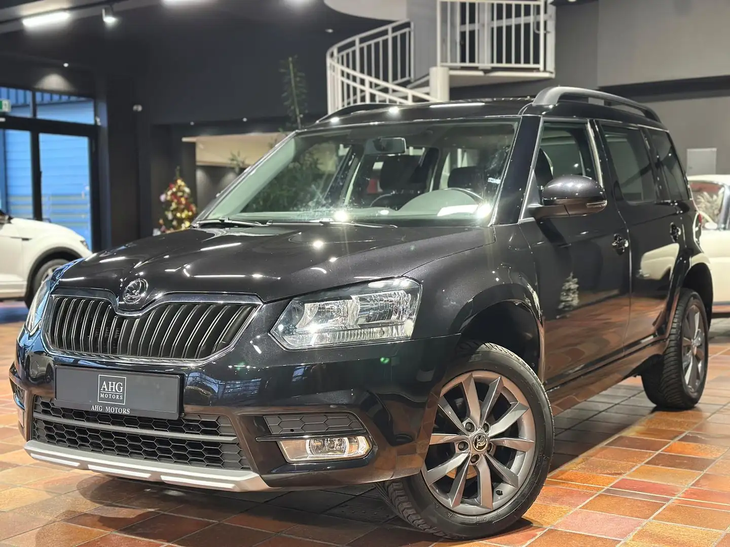 Skoda Yeti 1.4 TSI AMBITION KLIMAAUTO SHZ AHK ALU PDC BLUETOO Schwarz - 1