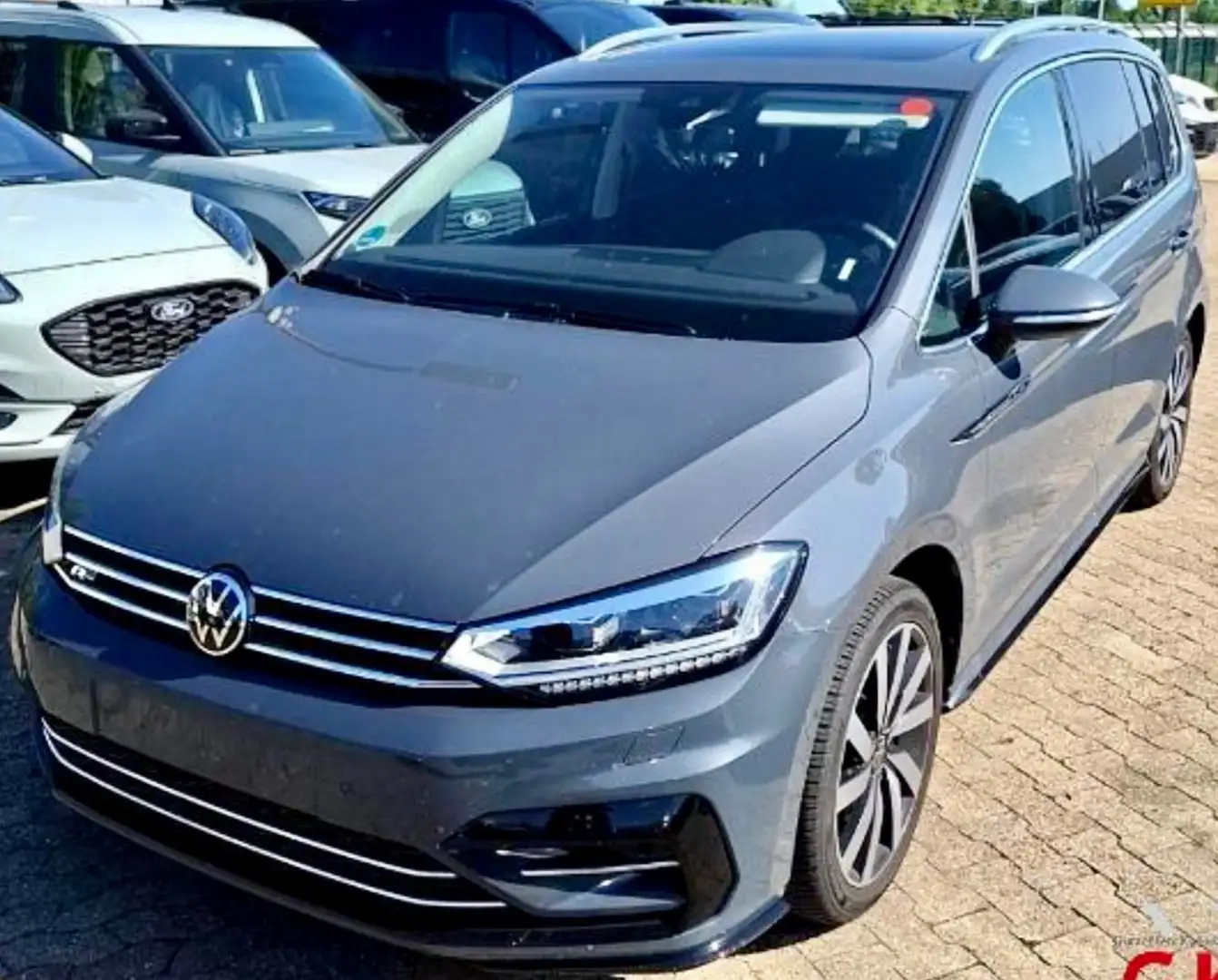 Volkswagen Touran Highline | DSG | R-Line | 7 Sitze | Pano | AHK | Grijs - 1