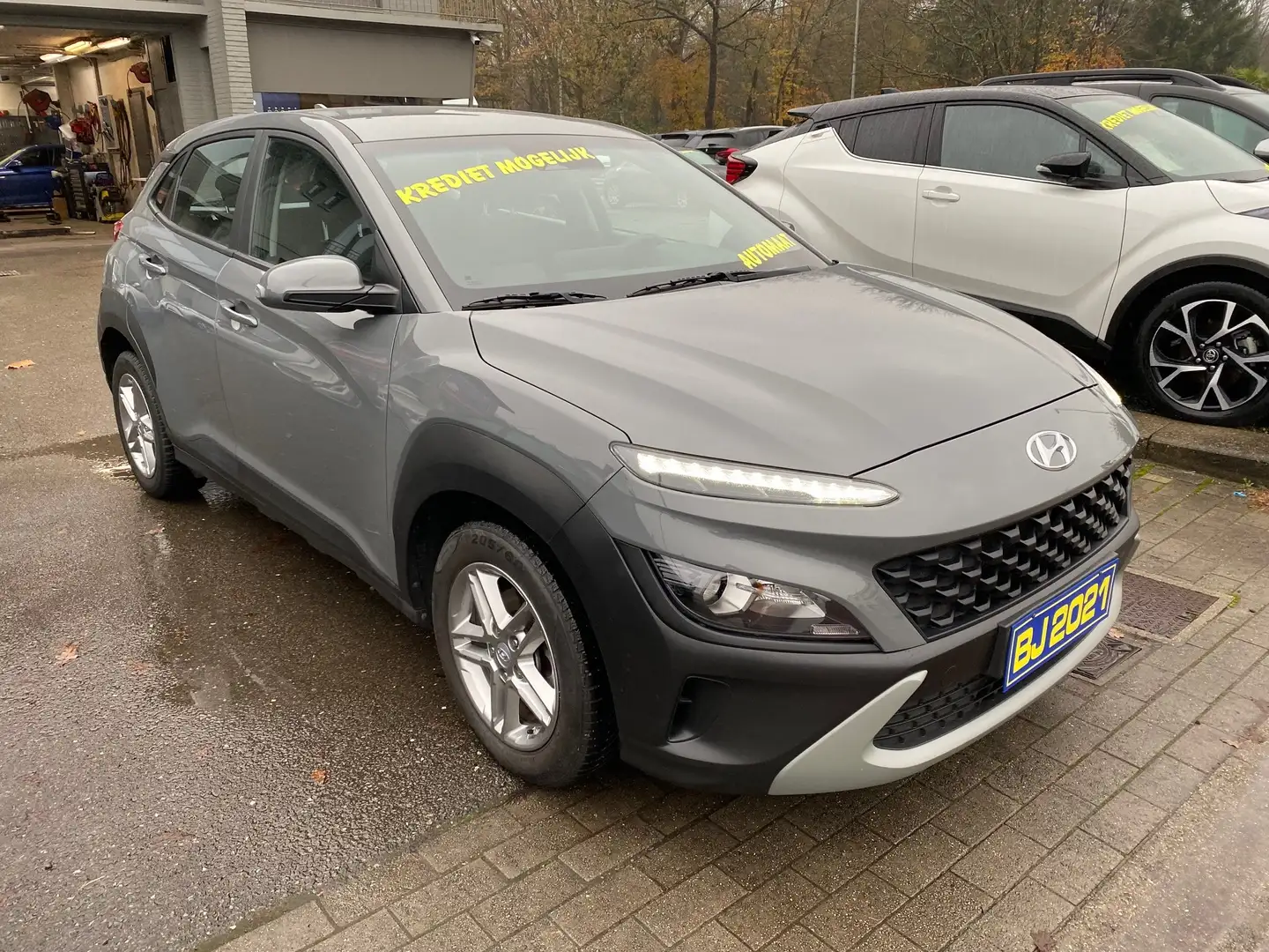 Hyundai KONA 1.0T -GDI AUTOMAAT MET GARANTIE EINDEJAARAKTIE-5% Grijs - 1