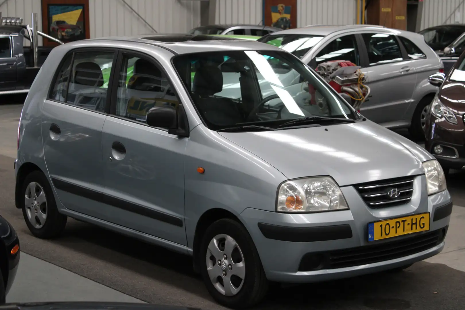 Hyundai Atos 1.1i Active Sky NAP, 5 Deurs, Kanteldak, Stuurbekr Grijs - 2