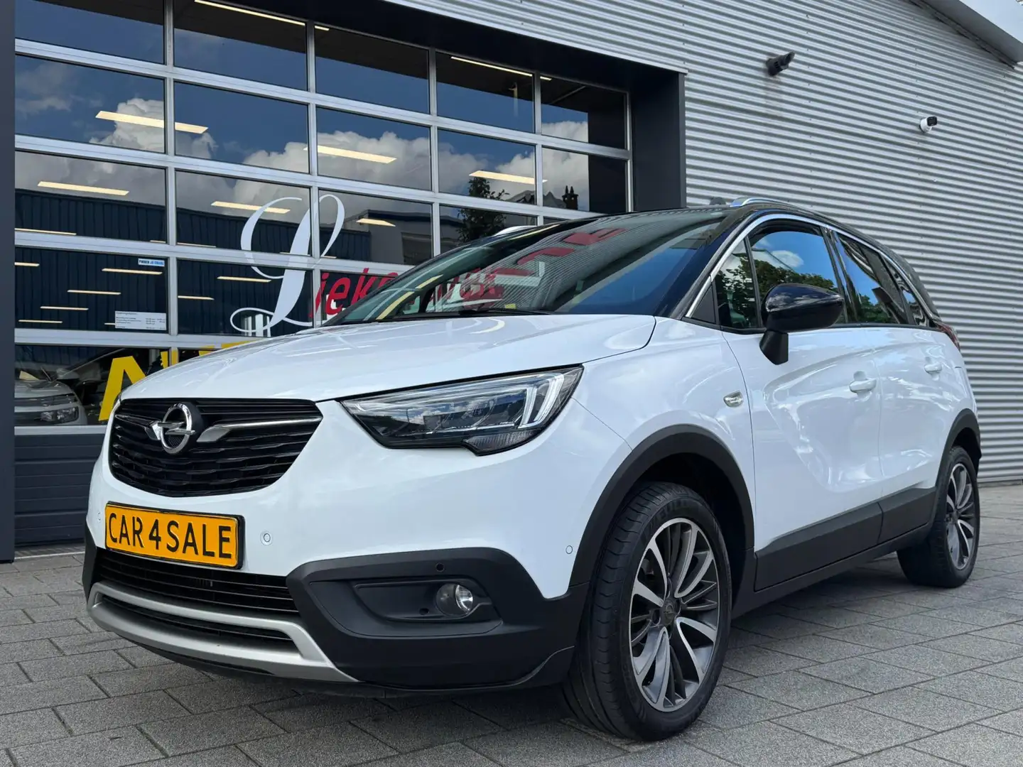 Opel Crossland X 1.2 Turbo - Automaat I Panorama dak I 1/2 Leer I N Wit - 1