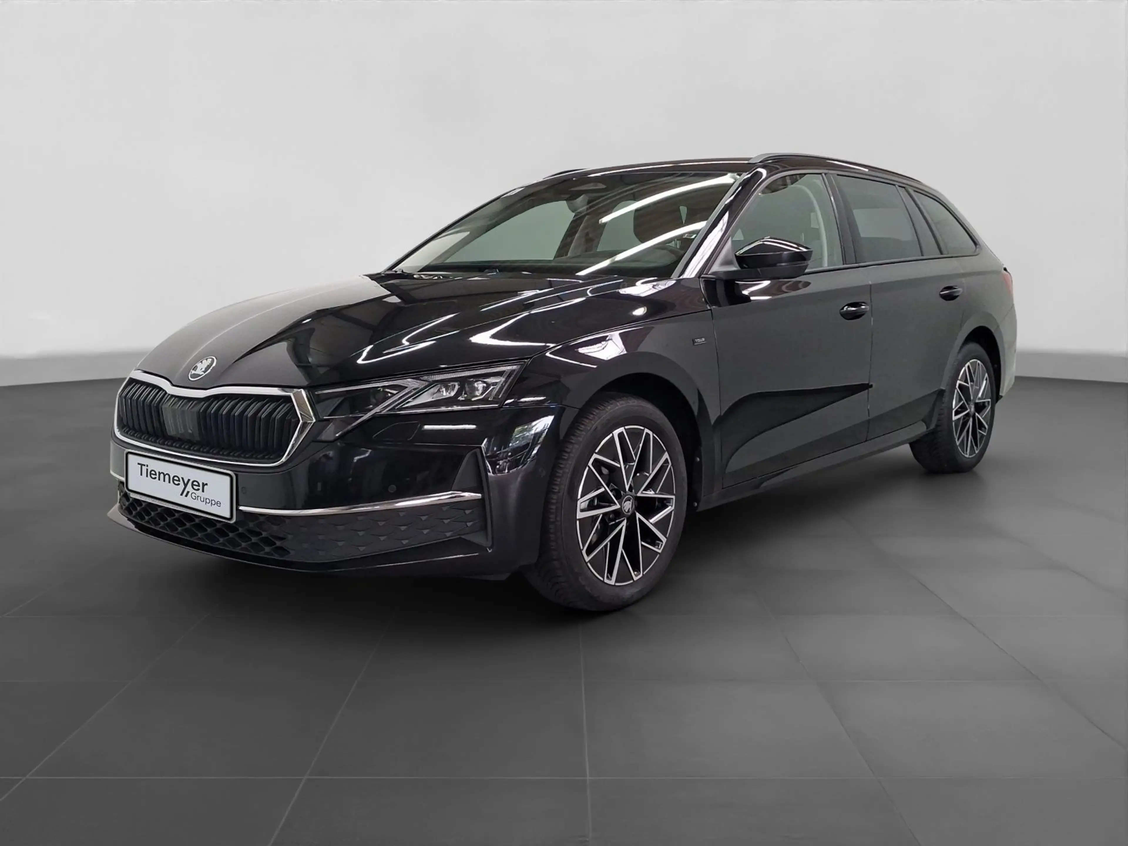 Skoda Octavia Combi 2.0 TDI DSG TOUR NAVI AREA-VIEW AC — photo 2