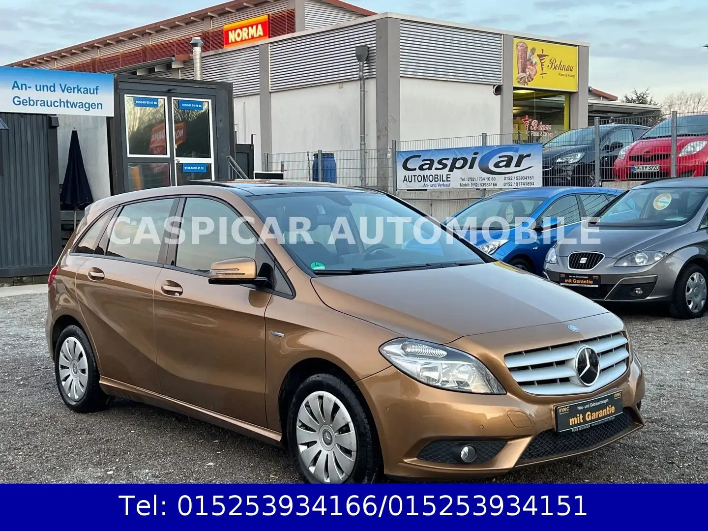 Mercedes-Benz B 200 KLIMAAUT.,PANORAMADACH,NAVI,SHZ,PDC,1.HAND Beige - 1