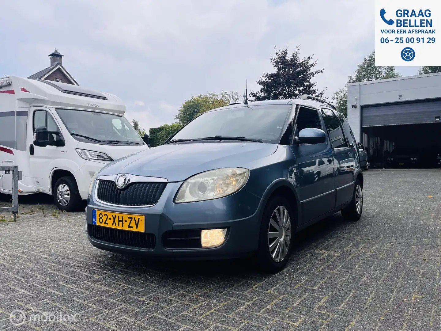 Skoda Roomster 1.4-16V Scout Airco / Cruise / Trekhaak Azul - 1