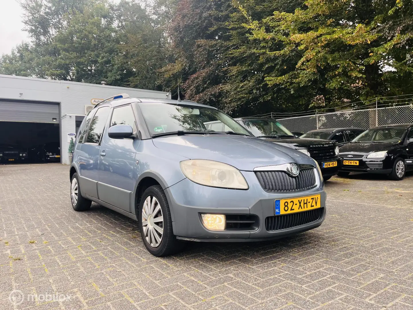 Skoda Roomster 1.4-16V Scout Airco / Cruise / Trekhaak Blauw - 2