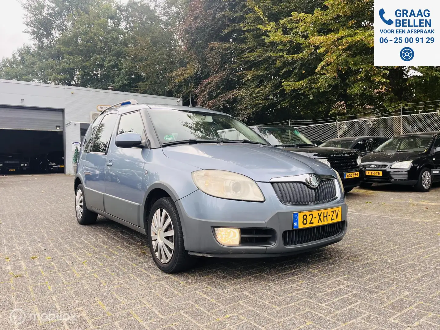 Skoda Roomster 1.4-16V Scout Airco / Cruise / Trekhaak Azul - 2