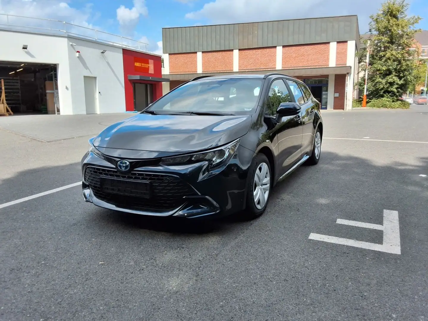 Toyota Corolla 1,8 Hybrid Comfort Touring Sports Schwarz - 1