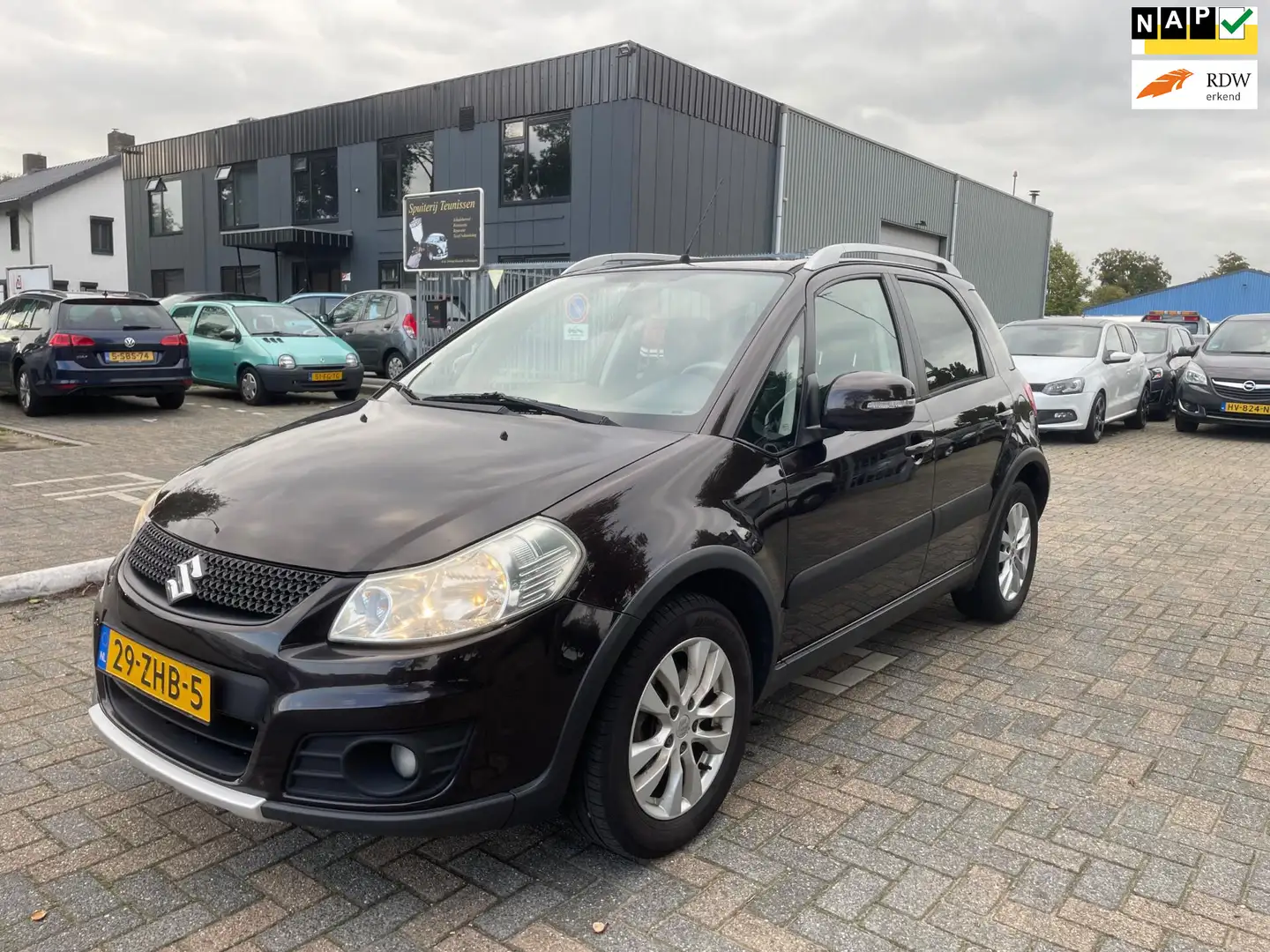 Suzuki SX4 1.6 Executive Keyless - Stoelverwarming Bruin - 1