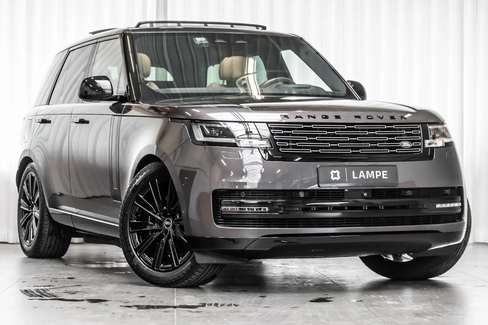 Land Rover Range Rover P440e HSE Hybrid Panodak Trekhaak Meridian HUD ACC Grijs - 1