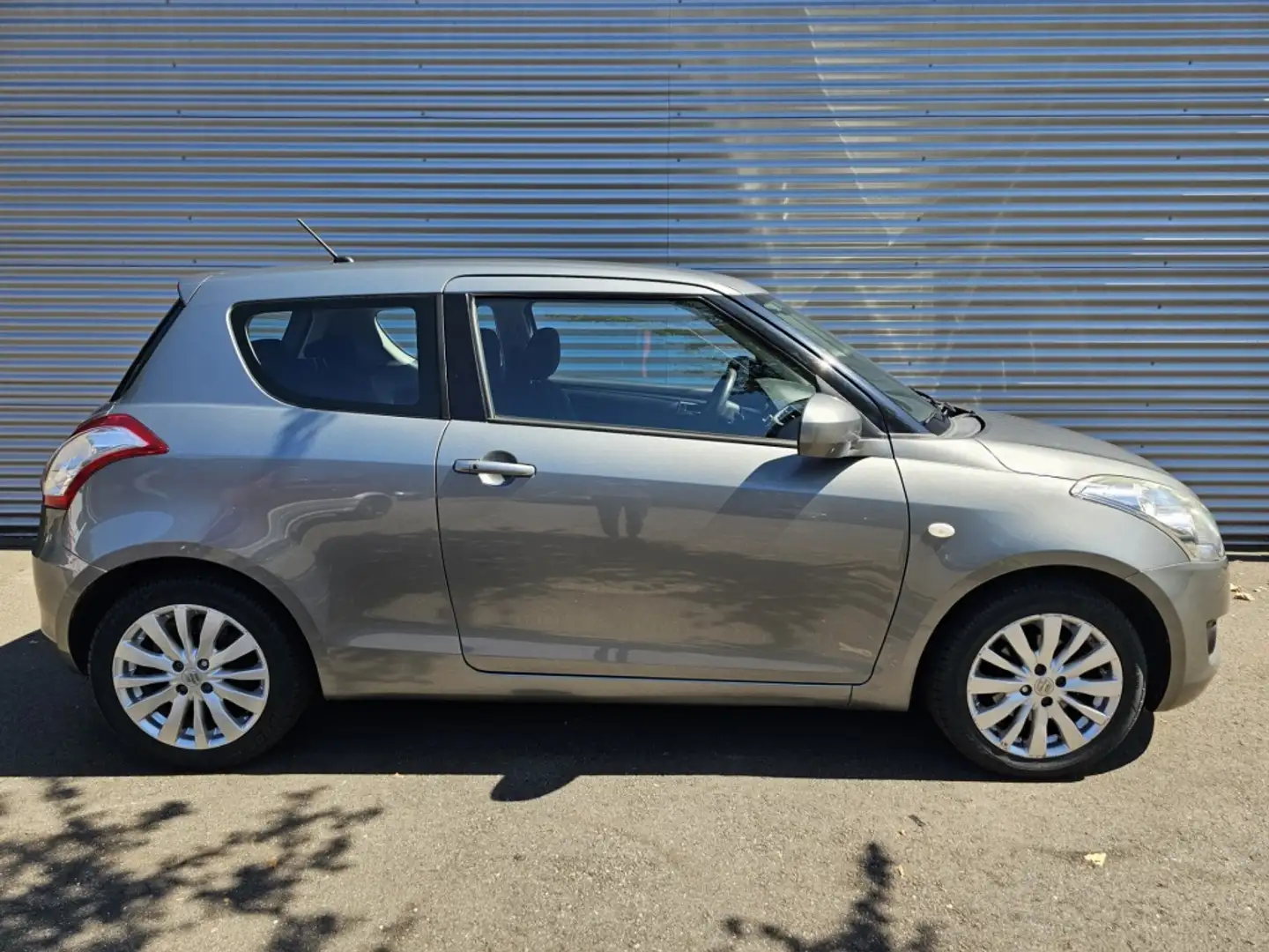 Suzuki Swift 1.2 Exclusive EASSS Grijs - 1