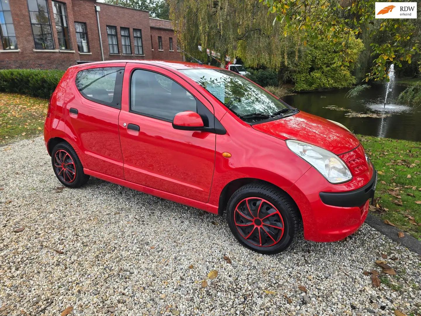 Nissan Pixo 1.0 Visia 5-deurs *apk:10-2026* Rot - 1