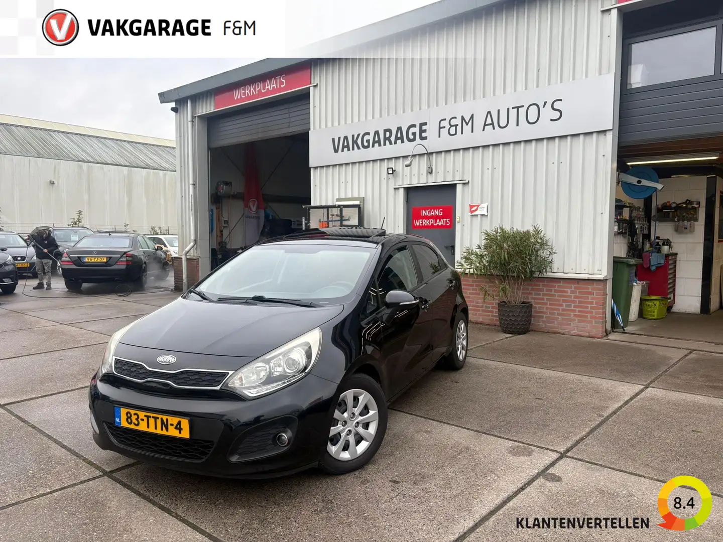 Kia Rio 1.2 CVVT Super Pack Zwart - 1