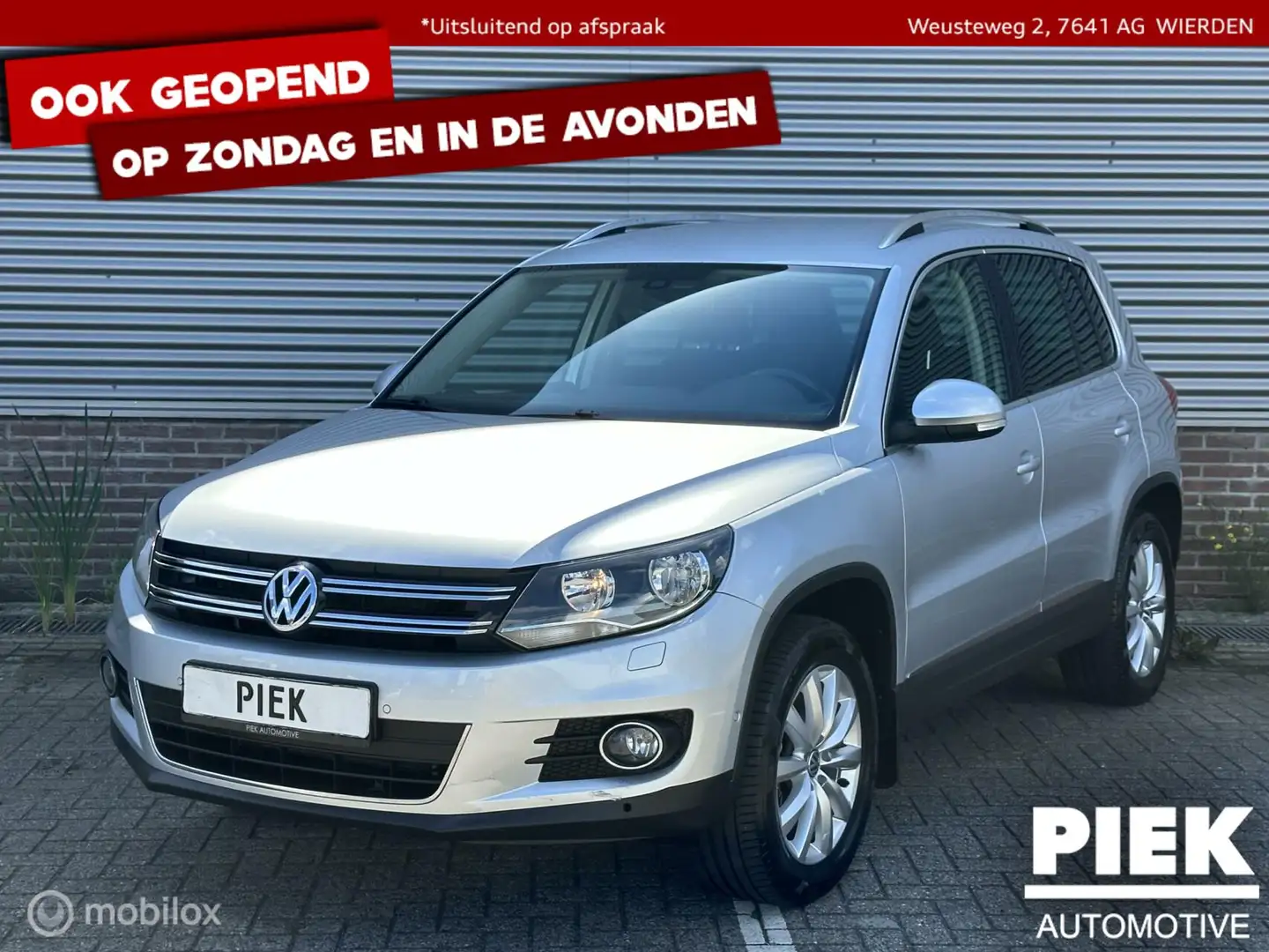 Volkswagen Tiguan 1.4 TSI Sport&Style 4Motion NIEUWSTAAT Grijs - 1