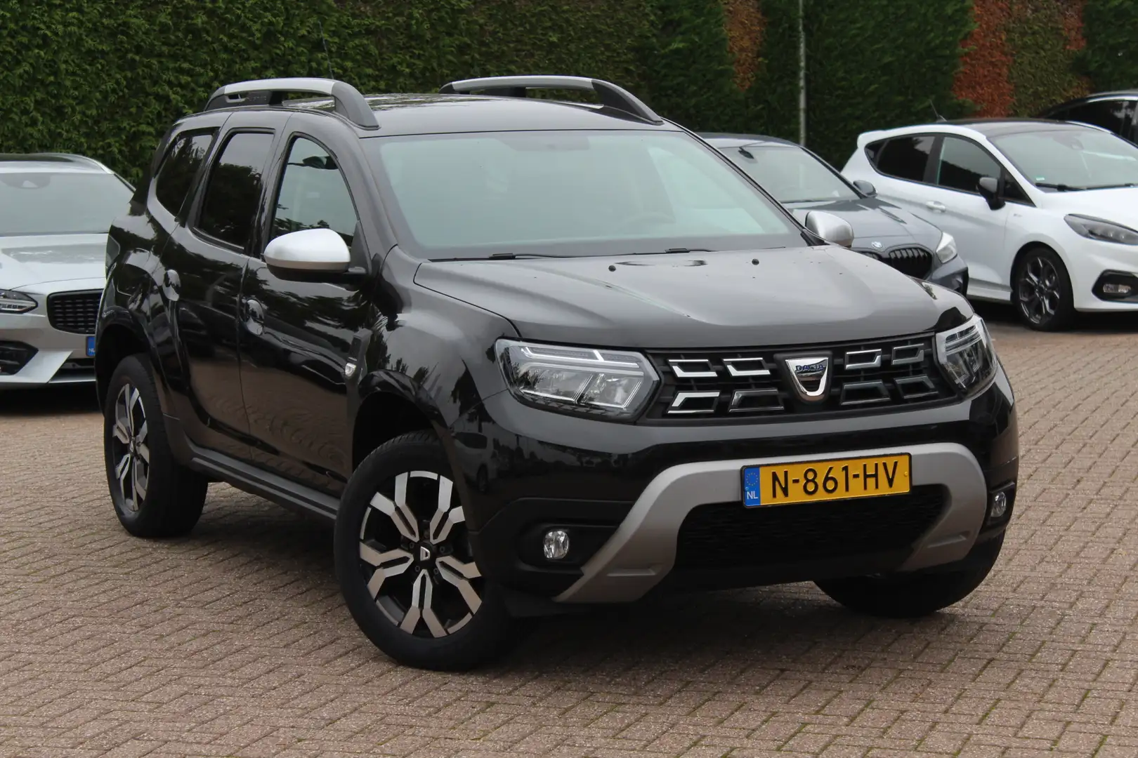 Dacia Duster 1.0 TCe Bi-Fuel Prestige / Camera / Navigatie / 17 Zwart - 1