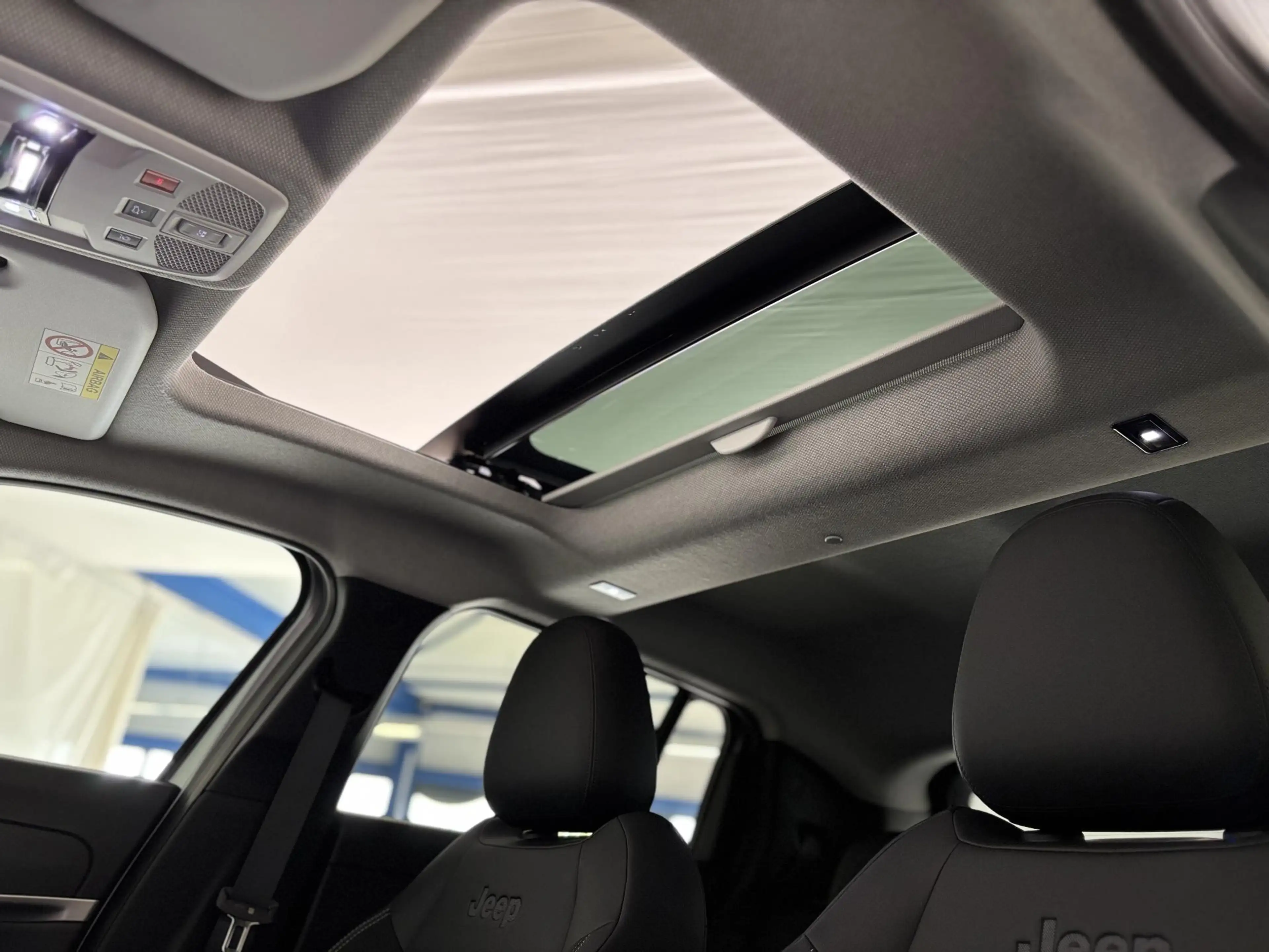 Jeep Avenger 1.2 e-Hybrid Summit | Apple/Android | Panoramadak — photo 21