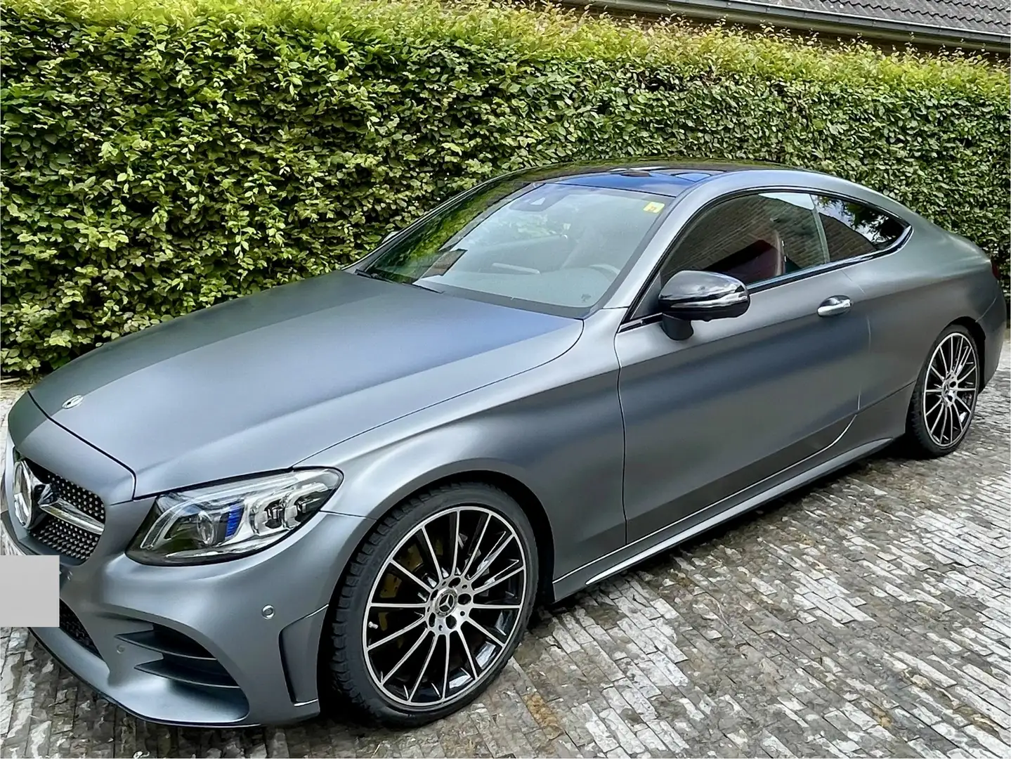 Mercedes-Benz C 200 Coupe 9G-TRONIC AMG Line Pano /Burmester Grijs - 1