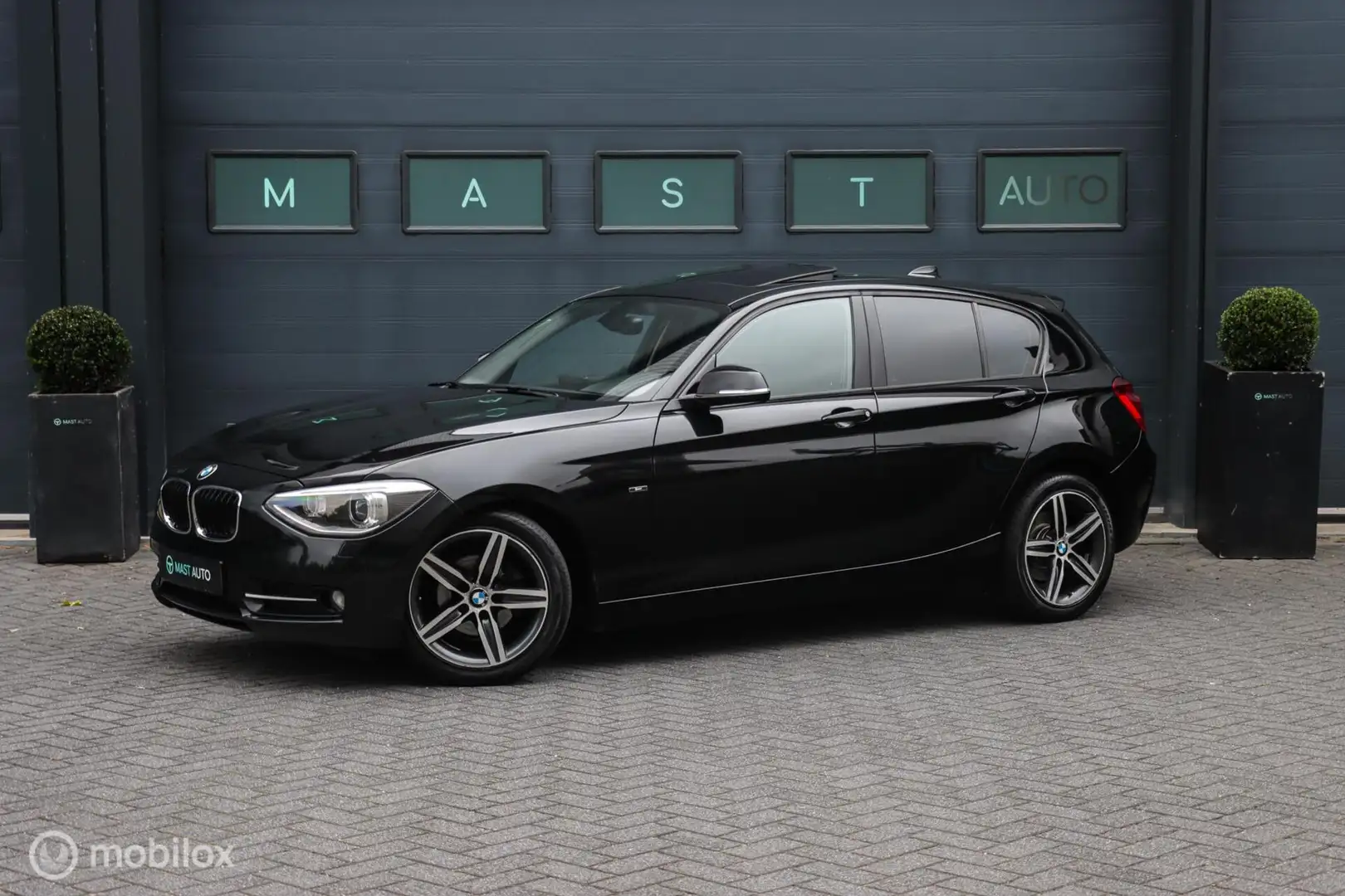 BMW 116 1-serie 116i Business Sport | Pano | Aut | Stoelve Zwart - 1