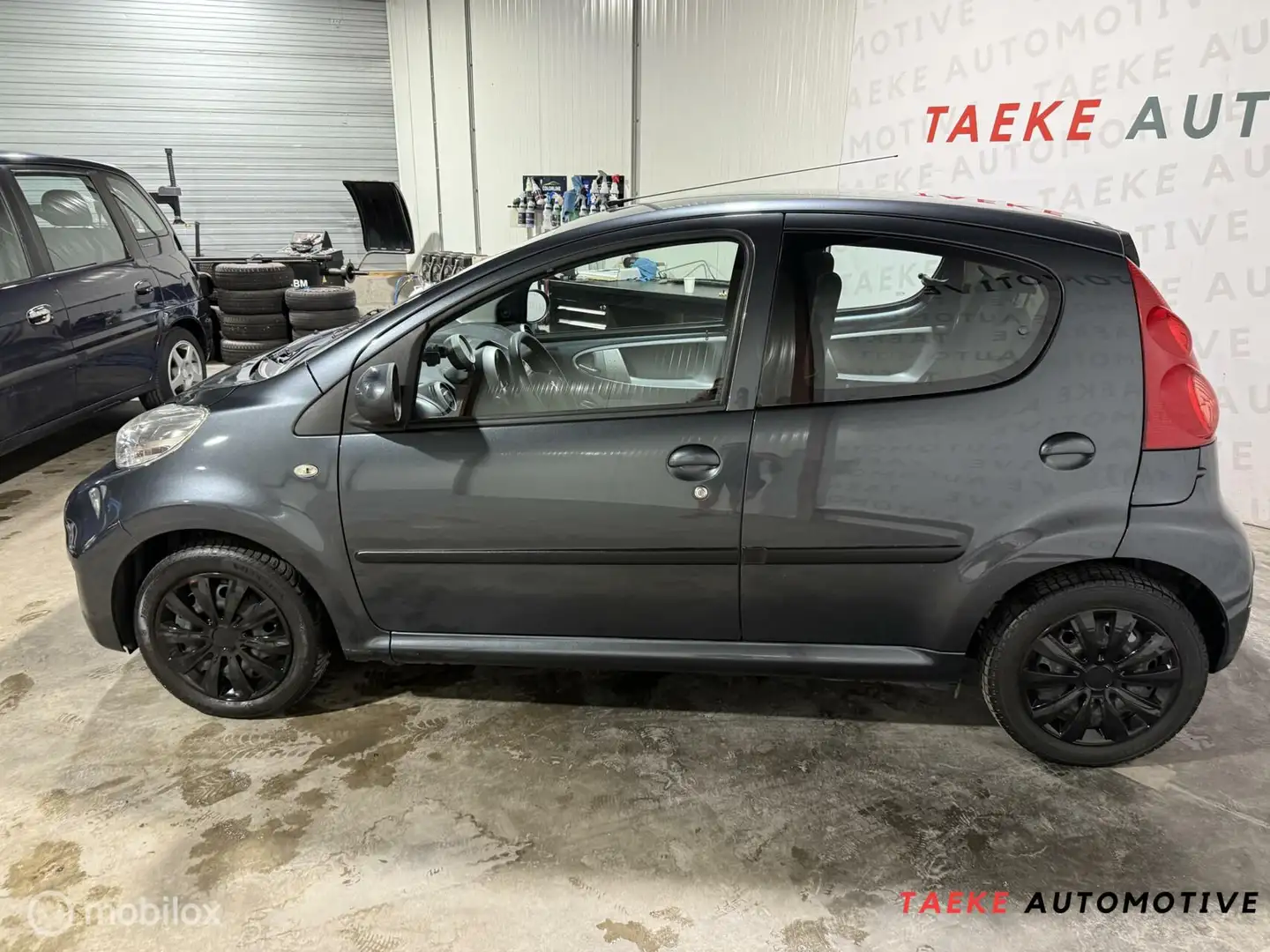 Peugeot 107 1.0-12V XS Airco/Apk/Nap/2e EIG Grijs - 2