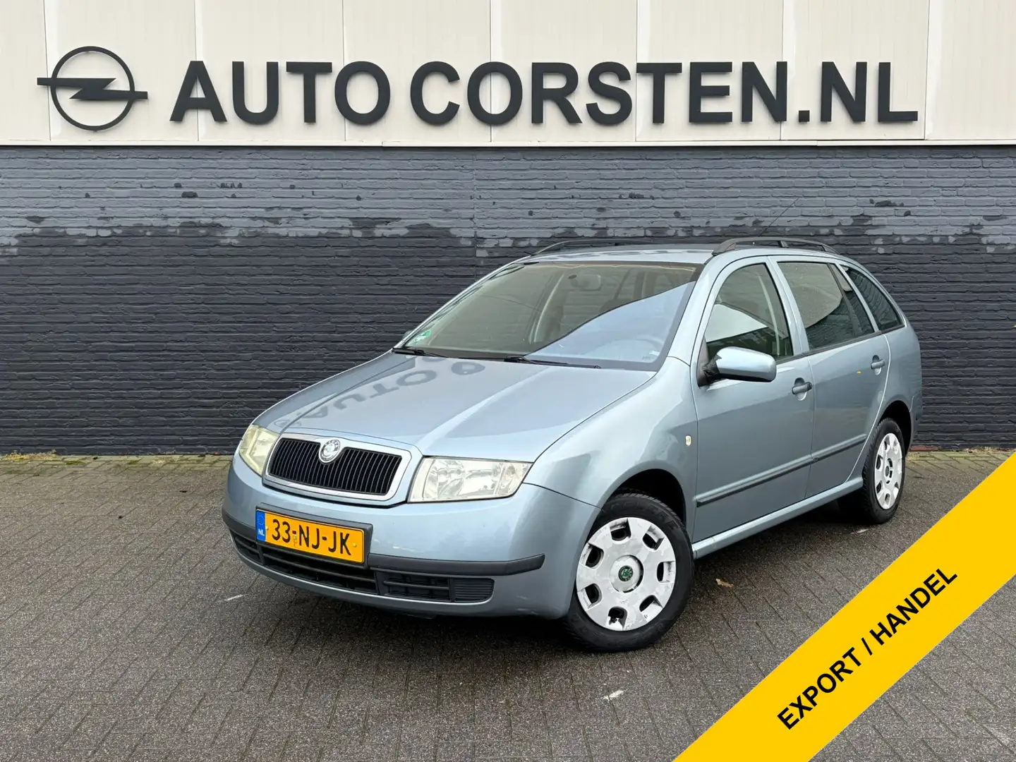 Skoda Fabia Combi 1.4-16V Flash Airco Cruise Control Trekhaak Grijs - 1