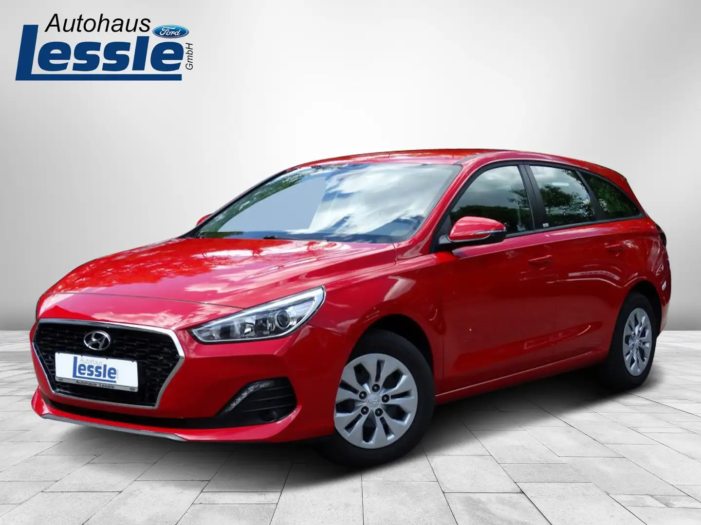 Hyundai i30 Kombi 1.4 Select Navi/Kamera/PDC/AHK Rood - 1