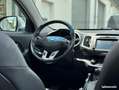 Kia Sportage 2.0L CRDI 135ch PREMIUM 4X4 BVA Toit ouvrant Siège Gris - thumbnail 4