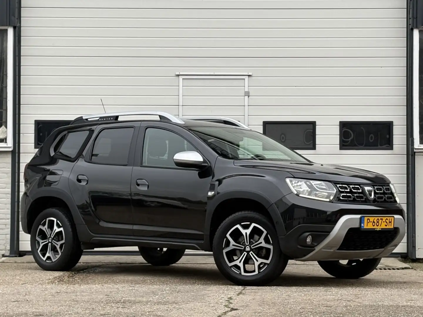 Dacia Duster 1.3 TCe Prestige Navi | Climate | Camera | Keyless Noir - 1