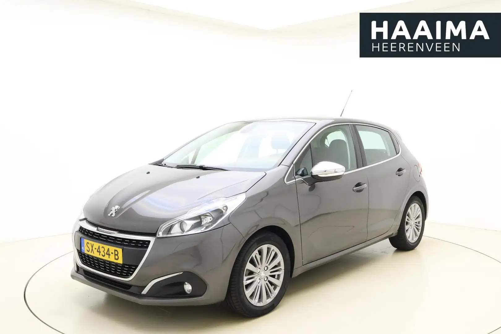 Peugeot 208 1.2 PureTech Blue Lease Executive | Navigatie | Cl Grijs - 1
