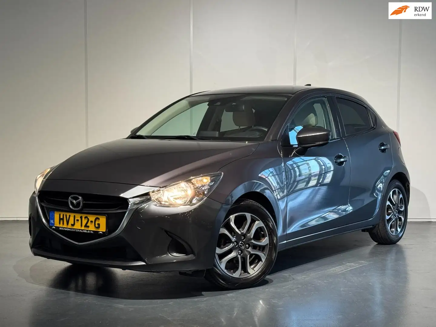 Mazda 2 1.5 Skyactiv-G TS /Airco/Cruise/PDC/Leer/NAVI/DAB+ Grijs - 1