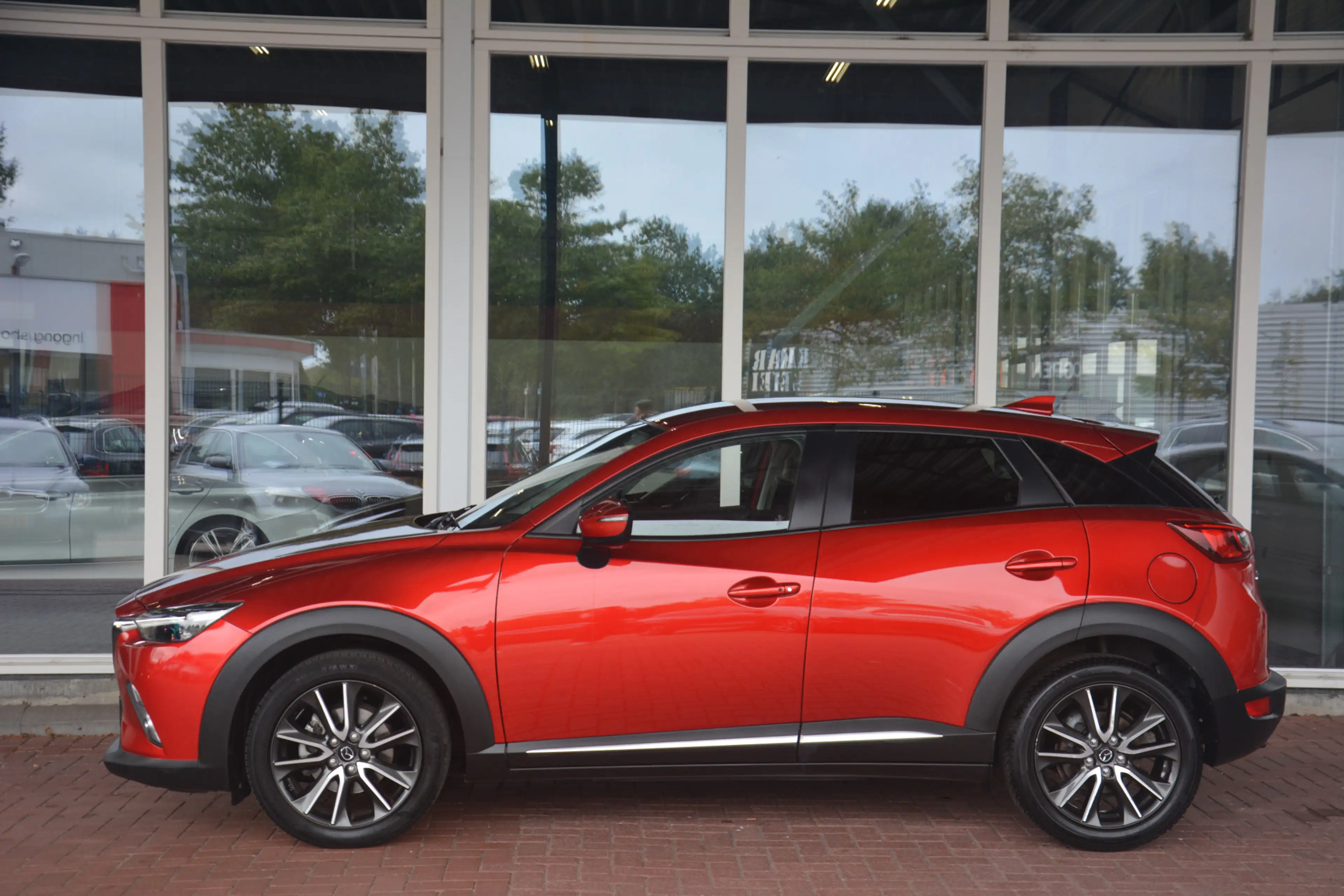 Mazda CX-3 2.0 SkyActiv-G 120 SkyLease GT | Navigatie | Leer — photo 31