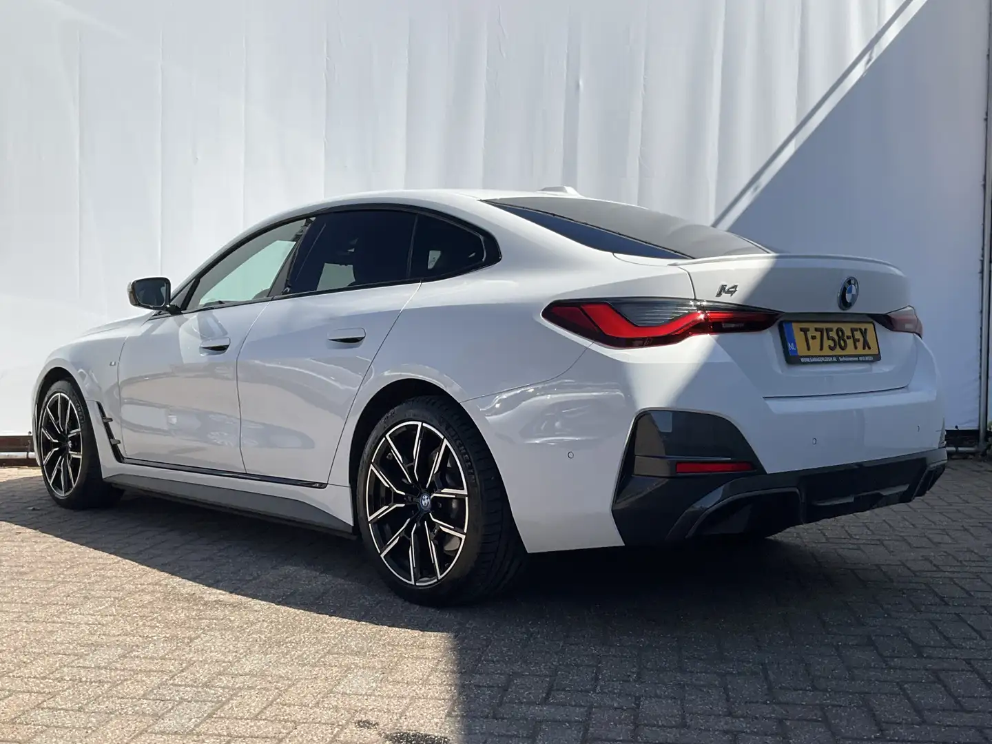 BMW i4 eDrive40 High Executive M-Sport 84 kWh Pano Leder Wit - 2
