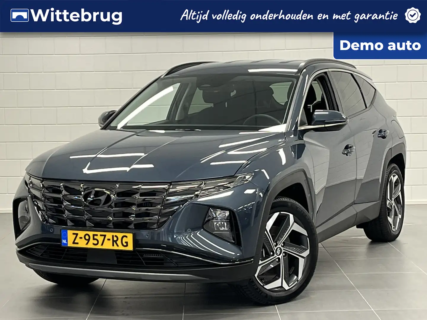 Hyundai TUCSON 1.6 T-GDI PHEV Comfort Smart 4WD NAVIGATIE | AUTOM Blauw - 1